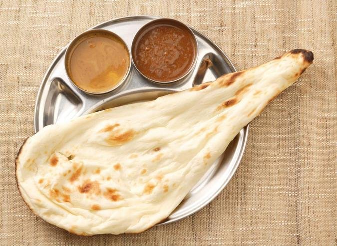 O naan tem uma textura mais fofa e sabor ligeiramente azedo (foto: Divulgao)